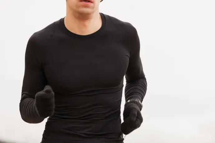 A high-performance men’s sportswear set designed for flexibility and comfort during workouts or outdoor activities. The image displays a breathable, moisture-wicking T-shirt paired with stretchable joggers, ideal for gym training, running, or yoga. The outfit features lightweight, quick-dry fabric, ergonomic seams, and a slim athletic fit for unrestricted movement. Stylish yet functional, this activewear set blends fitness fashion with performance. Available in multiple colors, suitable for all weather.